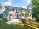 The backyard features a patio and large windows with ample natural light at 8803 Sweetwater Pl, Waxhaw, NC 28173