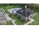 Aerial view of community clubhouse with pool, tennis courts, and parking at 897 Exeter Dr, Sherrills Ford, NC 28673