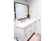 Well-lit bathroom showcasing a white vanity with a large mirror, offering a fresh and modern feel at 9805 Coatbridge Dr, Charlotte, NC 28269