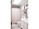 Clean bathroom featuring a vanity, toilet, and combination shower and tub that optimizes space at 9805 Coatbridge Dr, Charlotte, NC 28269