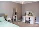 A bedroom featuring a full-length mirror, makeup table, and accents creating a relaxing personal space at 9805 Coatbridge Dr, Charlotte, NC 28269