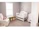 Cozy Bedroom features soft colors and a window providing a comforting, calm environment for a  at 9805 Coatbridge Dr, Charlotte, NC 28269