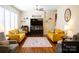 Bright and airy living room with neutral walls, hardwood floors, and comfortable sofas at 9805 Coatbridge Dr, Charlotte, NC 28269