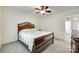 Bedroom with neutral walls, plush carpet, ceiling fan, and natural light at 1003 Silver Spring Rd, Fort Mill, SC 29715