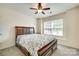 Comfortable bedroom featuring a ceiling fan and a large window for natural light at 1003 Silver Spring Rd, Fort Mill, SC 29715