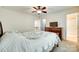 Bedroom with neutral walls, plush carpet, ceiling fan, and natural light at 1003 Silver Spring Rd, Fort Mill, SC 29715
