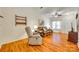 Warm living room with a cozy recliner, sofa, and a view of the front door at 1003 Silver Spring Rd, Fort Mill, SC 29715