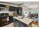 Spacious kitchen with stainless appliances, an island and plenty of cabinet space at 1007 W Cabaniss Rd, Shelby, NC 28150