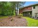 This charming backyard offers a lush lawn, a birdbath, and a tranquil atmosphere perfect for relaxation and outdoor enjoyment at 1035 Wexford Nw Pl, Concord, NC 28027