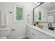 Stylish bathroom with dual sinks, granite countertops, and modern black fixtures at 1035 Wexford Nw Pl, Concord, NC 28027