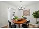 Charming dining area featuring a stylish light fixture and decorative wall art, perfect for intimate meals at 1035 Wexford Nw Pl, Concord, NC 28027