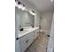 Modern bathroom with double sink vanity, quartz countertop, sleek black fixtures, and contemporary design at 120 Autumn Blaze Rd, China Grove, NC 28023