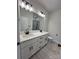 Contemporary bathroom features dual vanity, quartz countertop, sleek black fixtures, and plenty of room at 120 Autumn Blaze Rd, China Grove, NC 28023