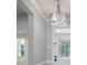Bright foyer with decorative chandelier and ornate front door at 1211 Gold Rush Ct, Fort Mill, SC 29708