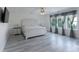 Spacious main bedroom features three windows and gray wood-look flooring at 1211 Gold Rush Ct, Fort Mill, SC 29708