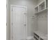 This practical mudroom features beadboard, shelving, hooks, and bench seating for easy organization at 1211 Gold Rush Ct, Fort Mill, SC 29708