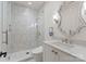 Clean bathroom featuring a glass door shower, tiled walls, and white vanity at 1220 Broadside Rd, York, SC 29745