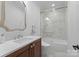 Modern bathroom with glass enclosed shower and white countertop sink at 1220 Broadside Rd, York, SC 29745