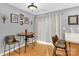 Cozy dining area with stylish seating, hardwood floors, and sliding glass doors at 125 Lynch Cir, Mooresville, NC 28117