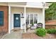 Inviting front porch with seating and a view, enhancing curb appeal with a tranquil ambiance at 125 Lynch Cir, Mooresville, NC 28117