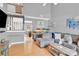 Inviting living room with high ceilings, an open staircase, and lots of natural light at 125 Lynch Cir, Mooresville, NC 28117