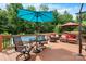 Enjoy outdoor living on this deck with patio set and lounge seating near the pool at 1305 Creekview Dr, Gastonia, NC 28052