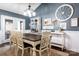 Elegant dining room features stylish furniture, decor, and an antique cabinet, creating a warm and inviting atmosphere at 1305 Creekview Dr, Gastonia, NC 28052