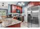 Well-appointed kitchen featuring granite countertops, stainless steel appliances, and ample cabinet space at 1305 Creekview Dr, Gastonia, NC 28052