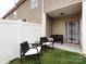 Charming backyard with a patio area, outdoor seating, and a barbecue grill, great for entertaining at 13422 Calloway Glen Dr, Charlotte, NC 28273