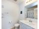 Bright bathroom with a modern vanity, decorative mirror, and beach-themed decor at 13422 Calloway Glen Dr, Charlotte, NC 28273