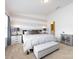 Bright main bedroom with a large bed, neutral decor, and plenty of natural light from multiple windows at 13422 Calloway Glen Dr, Charlotte, NC 28273