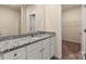 Modern bathroom featuring granite countertops, white cabinets, and neutral decor at 1522 Doran Ter, Richburg, SC 29729