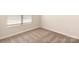 Bedroom features neutral carpeting and a window for natural light at 1522 Doran Ter, Richburg, SC 29729