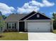 Charming single-Gathering home with a well-manicured lawn and a two-car garage at 1522 Doran Ter, Richburg, SC 29729