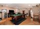 Finished basement area with a pool table, a bar, and an entertainment system at 161 Badin Lake Cir, New London, NC 28127
