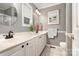 Beautiful bathroom with double sinks, and updated lighting fixtures at 161 Badin Lake Cir, New London, NC 28127