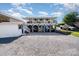 Exterior view of the home with covered parking and a spacious upper-level deck at 161 Badin Lake Cir, New London, NC 28127