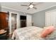 Comfortable bedroom with hardwood floors and neutral walls at 161 Badin Lake Cir, New London, NC 28127