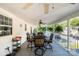 This spacious patio features lots of outdoor seating and multiple ceiling fans at 161 Badin Lake Cir, New London, NC 28127