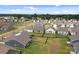 A beautiful neighborhood featuring well-maintained houses and green spaces at 161 Pampas Pl, Statesville, NC 28625