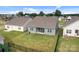 Picture of a beautiful backyard with manicured lawn and view of neighboring homes at 161 Pampas Pl, Statesville, NC 28625