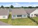 This aerial perspective highlights the backyard and the surrounding neighborhood at 161 Pampas Pl, Statesville, NC 28625