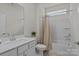Well-lit bathroom with modern fixtures, including a vanity with ample storage and a shower-tub combo at 161 Pampas Pl, Statesville, NC 28625