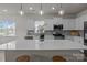 Modern kitchen features a large island, stainless steel appliances, and pendant lighting at 161 Pampas Pl, Statesville, NC 28625