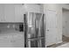 Bright, stainless steel refrigerator blends seamlessly with modern kitchen design and style at 161 Pampas Pl, Statesville, NC 28625
