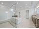 The primary bathroom features a soaking tub, a walk-in shower, and -and- vanities with granite countertops at 1702 Batson Creek Ln, Weddington, NC 28104