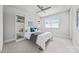 Stylish bedroom featuring a built-in Murphy bed, shelving, and a bright window at 1702 Batson Creek Ln, Weddington, NC 28104