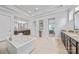This is a main bathroom with a soaking tub, double vanity, and is connected to the main bedroom at 1702 Batson Creek Ln, Weddington, NC 28104