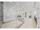 This is a glass-enclosed shower with tiled walls and floor and a built-in shower head at 1702 Batson Creek Ln, Weddington, NC 28104