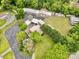 Sprawling property featuring multiple buildings, storage units, and lush green spaces at 1733 S Nc 16 Business Hwy, Stanley, NC 28164